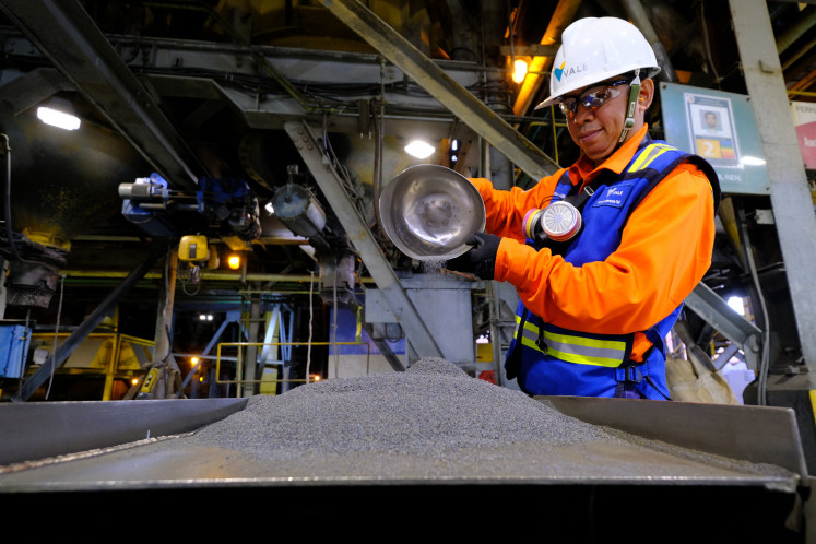 Quality control: A worker monitors production on Aug. 2, 2024, at the nickel smelter of PT Vale Indonesia in Sorowako, South Sulawesi. 