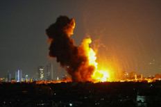 Israel pounds Beirut, levels residential complex