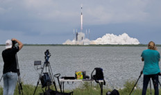 Journalists take pictures as a SpaceX Falcon 9 rocket lifts off carrying NASA's SpaceX Crew-9, Nick Hague and Roscosmos cosmonaut Alexander Gorbunov, to the International Space Station (ISS) from the Cape Canaveral Space Force Station in Cape Canaveral, Florida, the United States, on Sept. 28, 2024.