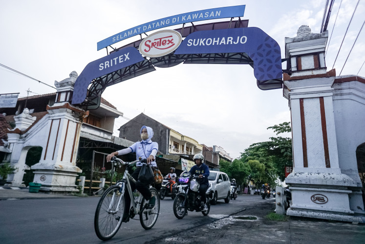 Workers leave a PT Sri Rejeki Isman (Sritex) factory in Sukoharjo, Central Java, on Oct. 24, 2024.