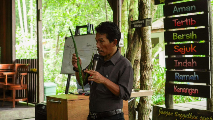 Agus Bay presents materials related to mangrove ecosystems and their management.