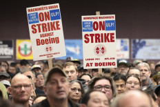 Boeing again raises offer to end strike, union to vote Monday
