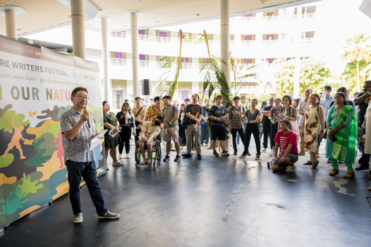 Singapore Writers Festival's new director Yong Shu Hoong (left) welcomes audiences at the SWF 2024 launch event on Sept. 4 ahead of the festival's run in November. (Courtesy of Arts House Limited)