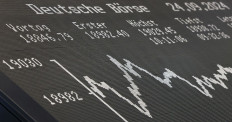 A board displays the chart of Germany's share index DAX at the stock exchange in Frankfurt am Main, Germany, on Sept. 24, 2024.