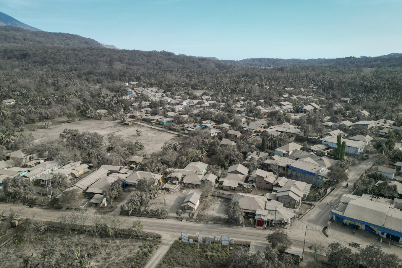 Houses, roads and trees are covered in volcanic ash in Boru village in East Flores, East Nusa Tenggara.on Nov. 11, 2024.