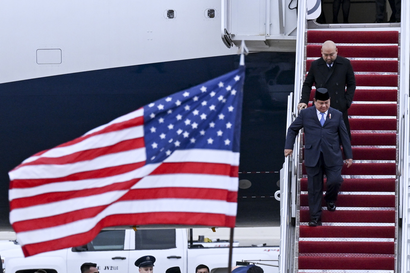 President Prabowo Subianto (left) accompanied by his son Didit Hediprasetyo arrives at the Andrews Air Force Base, Maryland, the United States, on Sunday, Nov. 10, 2024. Prabowo is scheduled to hold a series of meetings with his US counterpart Joe Biden on Tuesday.