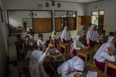 Safe learning environment: Students participate in classroom activities at the SD Negeri Karangbolong 2 elementary school in Cigeulis, Pandeglang regency, Banten, on Nov. 10, 2024. 