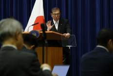 Japan PM expressed 'serious concerns' to Xi over South China Sea situation