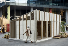 A visitor walks past a mycelium-based modular shelter, designed by the ReRoot initiative, as an alternative to the flimsy shelters now housing many thousands of Gazans displaced by more than a year of war, during the annual Design Week in Dubai on Nov. 9, 2024. Mycelium, the root-like part of a fungus, can be grown in combination with organic matter to fit different-shaped moulds, producing a strong building material that can be cultivated anywhere.