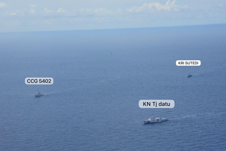 China Coast Guard's (CCG) patrol vessel CCG 5401 (left) is shadowed by Indonesian Maritime Security Agency's (Bakamla) patrol boat KN Tanjung Datu and Indonesian Navy's corvette KRI Sutedi Senoputra inside Indonesian exclusive economic zone (EEZ) on North Natuna Sea on Oct. 21, 2024. 