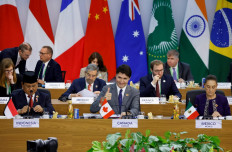 World leaders (from left, front row) Indonesian President Prabowo Subianto, Canadian Prime Minister Justin Trudeau and Mexican President Claudia Sheinbaum attend the opening session of the Group of 20 Summit 2024 on Nov. 18 in Rio de Janeiro, Brazil.