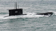 Ceremonial breach: Indonesian Navy submarine Cakra-401 resurfaces in Jakarta Bay on Sept. 10, 2024, during an event to mark the 79th anniversary of the Navy.