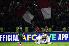 Indonesia defender Calvin Verdonk (center) embraces teammates Rizky Ridho Ramadhani (left) and Shayne Pattynama following their 2-0 victory against Saudi Arabia on Nov. 19, 2024, in the third round of the Asian World Cup qualifier at the Main Stadium of the Gelora Bung Karno Sports Complex in Jakarta.