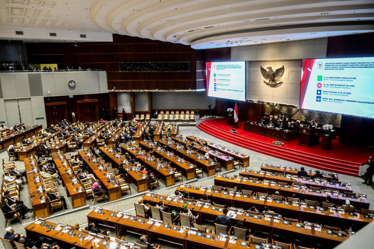 House of Representatives lawmakers attend a plenary session at the Senayan legislative complex in Jakarta on Nov. 12, 2024.