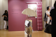 A lamp and stand by graffiti artist Sicovecas are made from a collage of ceramics, glass and other materials. 