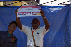 A poll administrator counts votes for the Southwest Papua gubernatorial election at a polling station in Sorong, Southwest Papua, on Nov. 27, 2024. Poll workers at 380 polling stations across Sorong tallied votes for the first Southwest Papua gubernatorial election, as well as the Sorong mayoral election, after the polls closed at 1 p.m. local time on Nov. 27, 2024.