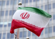 The flag of Iran flutters in the wind outside of the International Atomic Energy Agency's (IAEA) headquarters during the agency's board of governors meeting at the agency's headquarters in Vienna, Austria, on Nov. 20, 2024.