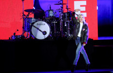 Lady Gaga waves on stage during Democratic presidential nominee Kamala Harris' campaign rally in Philadelphia, Pennsylvania, the United States, on Nov. 4, 2024.