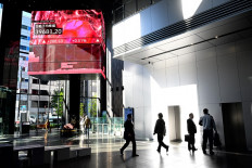 Asian markets track Wall St rout as Fed pares rate-cut forecast