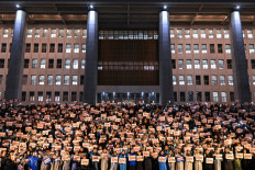 Democracy in action: Protesters take part in a candlelight rally calling for the ouster of South Korean President Yoon Suk-yeol on the steps of the National Assembly in Seoul, on Dec. 5. 