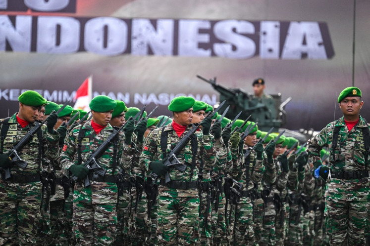 Army personnel march during an event marking the 79th anniversary of the Indonesian Military (TNI) in Banda Aceh, Aceh on Oct. 5, 2024.