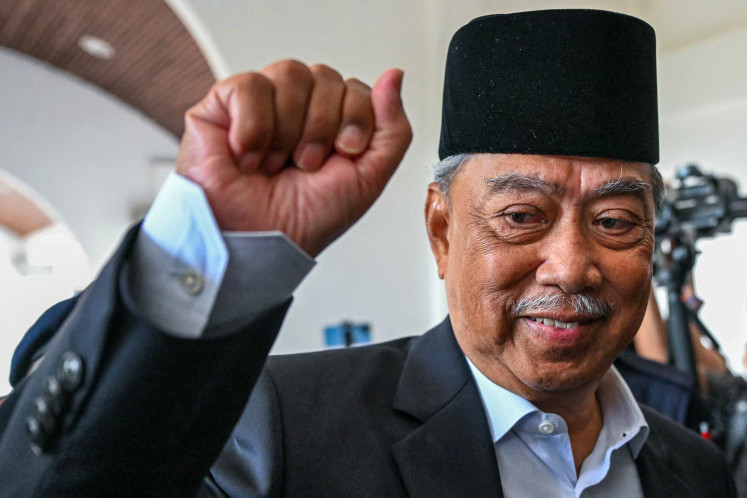 Former prime minister of Malaysia and Perikatan Nasional (PN) chairman Muhyiddin Yassin arrives at the court in Gua Musang in Kelantan state on Aug. 27, 2024, after being charged for sedition over monarchy remarks. 