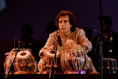Indian musician, percussionist and tabla exponent Zakir Hussain performs during a concert at the Indian Music Experience (IME), the countrys first interactive music museum, in Bangalore on July 27, 2019. 