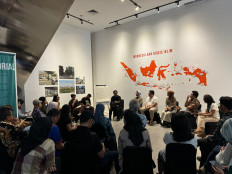 Participants attend an Indonesia Climate Week event at Taman Ismail Marzuki in Jakarta on Dec. 13, 2024. The event, organized by the Voices for Just Climate Action (VCA) Indonesia, aimed to raise awareness and serve as a discussion platform to push for measures for climate crisis adaptation.