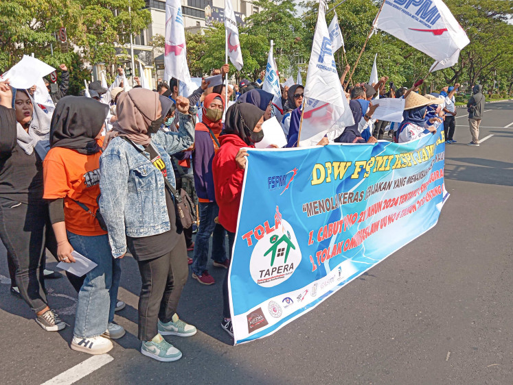Indonesians in Semarang protest the Tapera housing savings program on May 2.