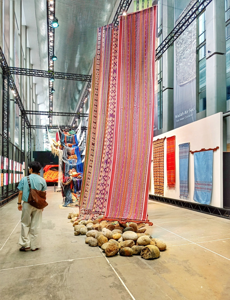 Naturally dyed tenun from East Nusa Tenggara’s Alor Island are suspended from the ceilings of the National Museum in Central Jakarta during “The Flying Cloth” handwoven textile exhibition, which ran from Nov. 11 to 24.