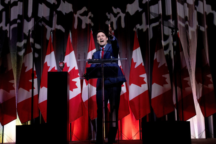 Canada’s Prime Minister Justin Trudeau speaks at the federal Liberal caucus holiday party in Ottawa on Dec. 17, 2024, the day after Finance Minister Chrystia Freeland unexpectedly resigned.