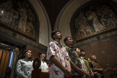 Worshippers celebrate Christmas in Jakarta churches