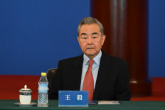 China's Foreign Minister Wang Yi attends the opening ceremony of the symposium on the International Situation and China's Foreign Relations 2024 at the Diaoyutai State Guesthouse in Beijing on Dec. 17, 2024.