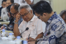 Higher Education, Science and Technology Minister Satryo Soemantri Brodjonegoro (center) attends a meeting with the Regional Representatives Council's (DPD) Committee III overseeing education and culture on Dec. 3, 2024,  at the Senayan legislative complex in Jakarta.