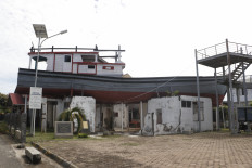 A famous fishing boat in Lampulo village, Banda Aceh, Aceh, is preserved and become the village's main tourism attraction as pictured in this photo taken on Dec. 11, 2024. The boat was swept by the waves onto the roof of a house during the 2004 earthquake and tsunami that killed more than 170,000 people across Aceh.