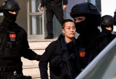 Montenegrin police officers of the PJP (Special Police Unit) escort South Korean cryptocurrency entrepreneur Do Kwon (center) at the exit of a court in Podgorica, Montenegro, on March 23, 2024. Montenegro will extradite South Korean cryptocurrency specialist Do Kwon, also wanted by South Korea for the multi-billion dollar bankruptcy of his company Terraform Labs, to the United States, as announced by the Montenegrin Ministry of Justice.