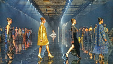 Confident color: Models present Supernova, a fashion collection by Ivan Gunawan. The collection features navy blue, silver, black and yellow colors which are deemed to be trending in 2025. 