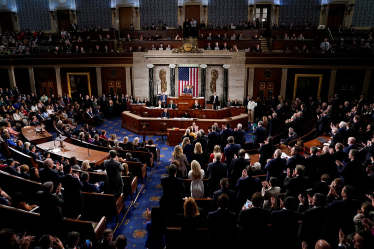 Republicans applaud as United States Representative Mike Johnson (R-LA) speaks after being reelected as Speaker of the House on the first day of the 119th Congress at the US Capitol in Washington on Jan. 3, 2025. REUTERS/Elizabeth Frantz