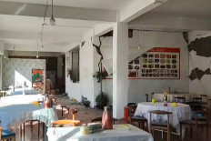 This frame grab from a user-generated content (UGC) video on January 7, 2025 shows cracks on the walls of a restaurant in Lhatse County in China's Tibet after an earthquake struck the area. A devastating earthquake in China's remote Tibet region killed at least 53 people and collapsed “many buildings“ on January 7, state media reported, with tremors also felt in neighboring Nepal's capital Kathmandu and parts of India. 