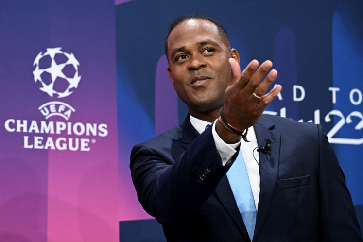 UEFA Champions League final ambassador Dutch former footballer Patrick Kluivert attends a ceremony of the draw for the quarter-final, semi-final and final of the 2022-2023 UEFA Champions League football tournament, in Nyon, on March 17, 2023. 