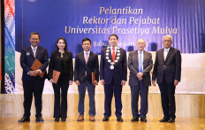 Newly installed Prasetiya Mulya University administrators (from left) provosts Stevanus Wisnu Wijaya and Christiana Yosevina, deputy rector Fathony Rahman and rector Hassan Wirajuda pose with Prasetiya Mulya Foundation board of trustees deputy chair Jusuf Wanandi and board of executives chair Djisman Simandjuntak on Jan. 8, 2025, after their inauguration ceremony at the university’s BSD campus in Tangerang, Banten.