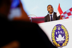 Newly appointed Indonesian national soccer team coach Patrick Kluivert speaks during a press conference in Jakarta, Indonesia, on Monday, January 12, 2025. 