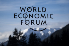 A sign of the World Economic Forum (WEF) with mountains in the background on Jan. 20, 2025, ahead of the WEF annual meeting in Davos, Switzerland.
