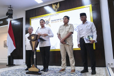 Coordinating Infrastructure and Regional Development Minister Agus Harimurti Yudhoyono (second left) speaks at a press briefing with Nusantara Capital City (IKN) Authority head Basuki Hadimuljono (left), Public Housing and Settlements Minister Maruarar Sirait (second left) and Public Works Minister Dody Hanggodo on Jan. 21 at the Presidential Office in Jakarta.