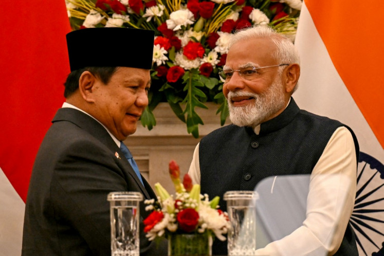 President Prabowo Subianto (left) and Indian Prime Minister Narendra Modi gesture during a joint press briefing at Hyderabad House in New Delhi on Jan. 25, 2025.