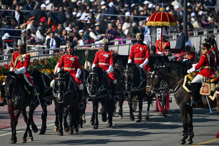 Guest of honour, President Prabowo Subianto (right) arrives with India's President Droupadi Murmu (Not pictured) to attend Indias 76th Republic Day parade in New Delhi on January 26, 2025. 