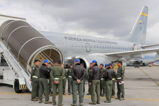 This handout picture released by the Colombian Aerospace Force press office shows a Boeing 737-700 aircraft before preparing to take off to San Diego, California, to bring back people deported by the US, at the Military Air Transport Command CATAM in Bogota on January 27, 2025. Colombia announced on Monday the takeoff of a military plane to the United States that will bring 110 Colombian deportees, after overcoming diplomatic tensions with the Donald Trump administration.