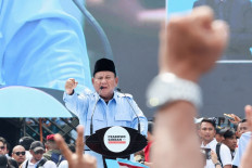 Presidential candidate Prabowo Subianto gestures as he addresses his supporters during a campaign rally in Jakarta, on Feb. 10, 2024. 