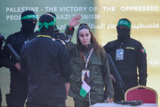Hamas hands over woman hostage as third exchange begins