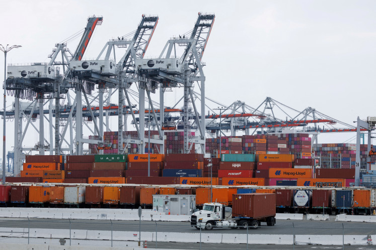 Shipping containers are seen at the Terminal 1 container terminal at the Port of Los Angeles in Wilmington, California, US, on Oct. 17, 2024.